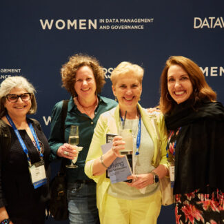 group of conference attendee women smiling
